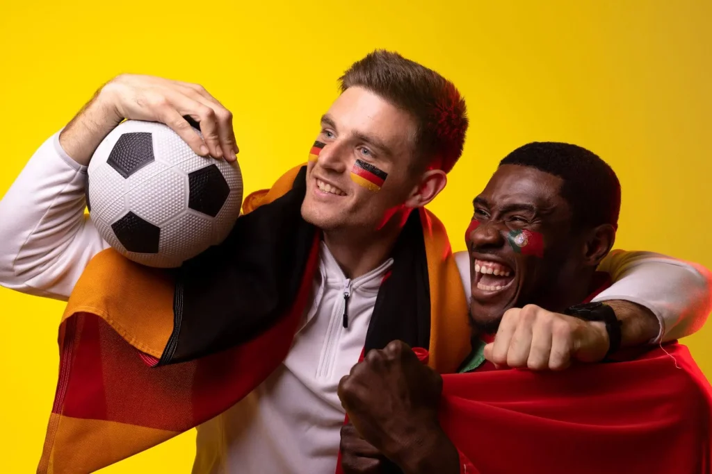 Zwei Fans freuen sich auf neue Wettanbieter 2025